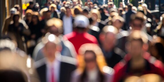 Crowd of people in a busy city, user research