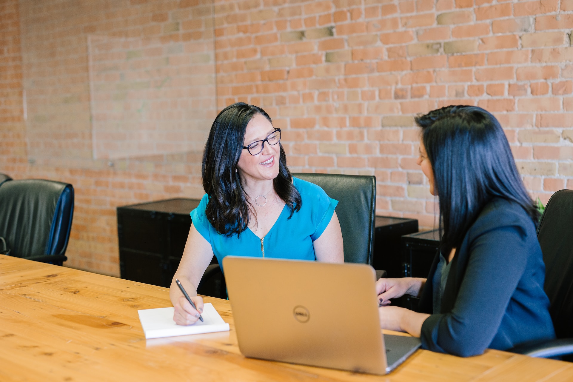 Two women discuss digital strategy